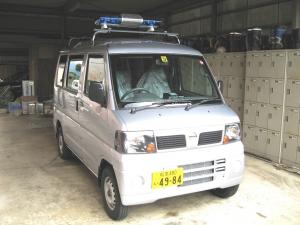 青色回転灯車